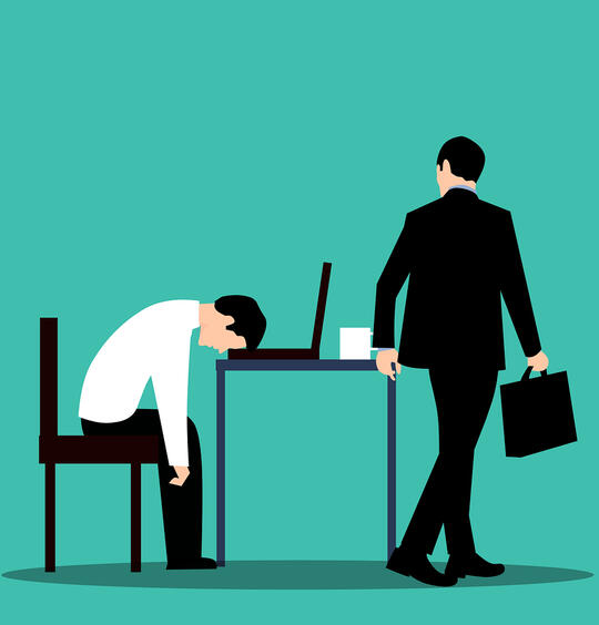 A worker putting their head down on their laptop as another worker with a briefcase passes by and looks at them. Image credit: Mohamed_hassan on Pixabay